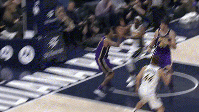 Basketball Player Number 14 Driving Past Defender GIF