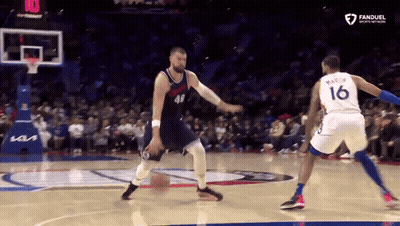 Basketball Player Number 16 Dribbling Ball GIF