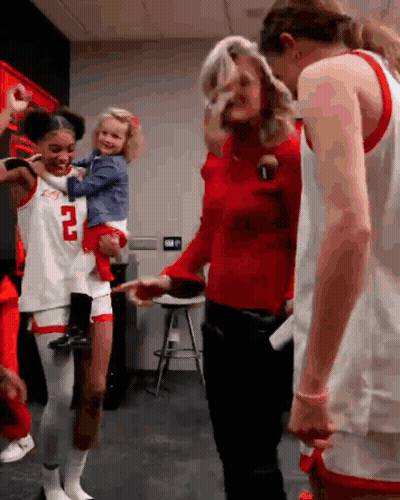 Basketball Player Number 2 Holding Child GIF