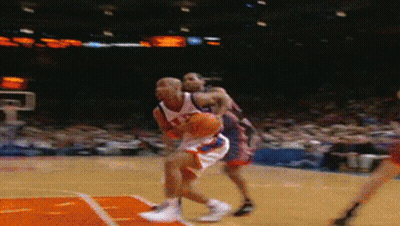 Basketball Player Number 21 Dribbling GIF