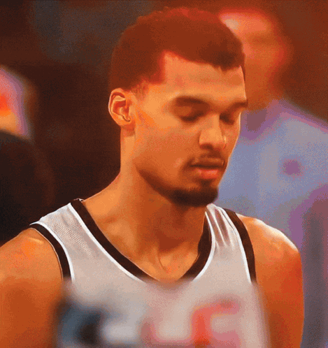 Basketball Player Number 23 Looking Down GIF