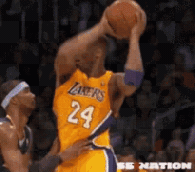 Basketball Player Number 24 Holding Ball Over Head GIF