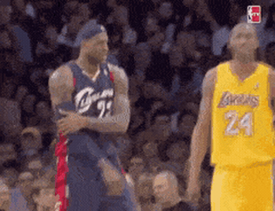 Basketball Player Number 24 Standing Next To Teammate GIF
