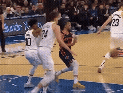 Basketball Player Number 24 Surrounded By Players GIF