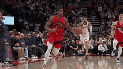 Basketball Player Number 30 Dribbling GIF