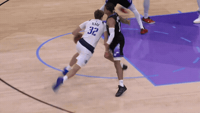 Basketball Player Number 32 Dribbling GIF