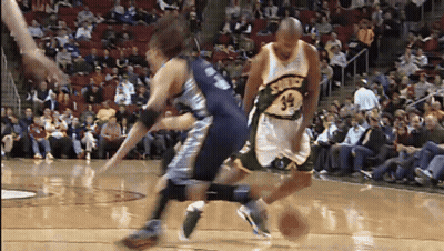 Basketball Player Number 32 Dribbling GIF