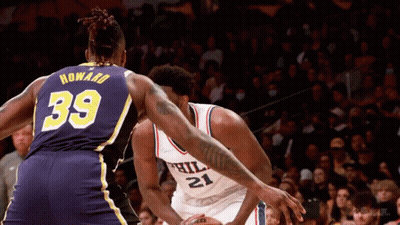 Basketball Player Number 39 Playing Against Another GIF