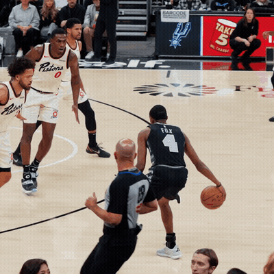 Basketball Player Number 4 Dribbling Ball GIF