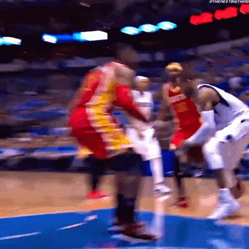 Basketball Player Number 5 Jumping Over Opponent GIF