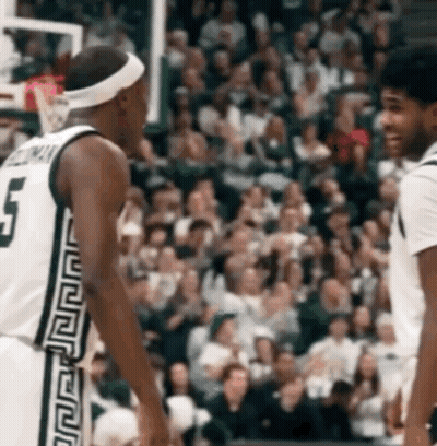 Basketball Player Number 5 Talking To Another Player GIF