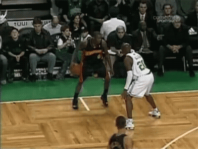 Basketball Player Number 52 Dribbling GIF