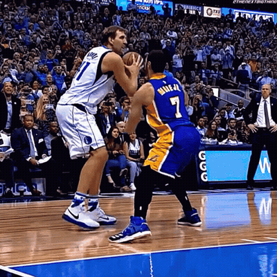 Basketball Player Number 7 Blocking Another Player GIF
