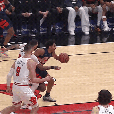 Basketball Player Number 9 Dribbling GIF