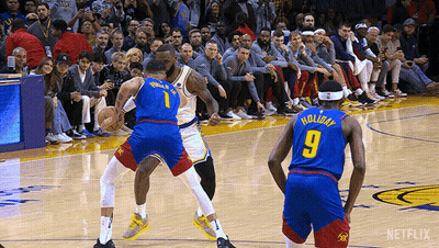 Basketball Player Number 9 Dribbling GIF