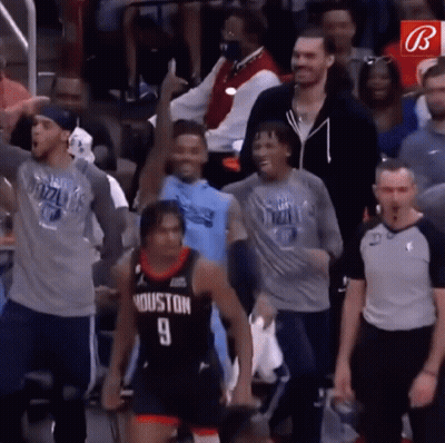 Basketball Player Number 9 Surrounded By Fans GIF