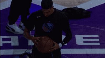 Basketball Player On Purple Court GIF