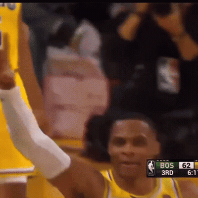 Basketball Player Raising Hand While Playing GIF