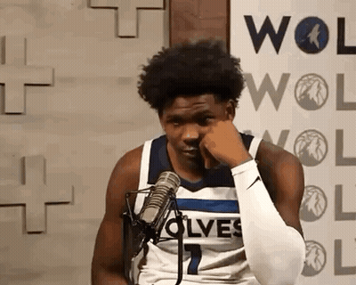 Basketball Player Sitting At Microphone GIF