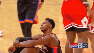 Basketball Player Sitting During Game GIF