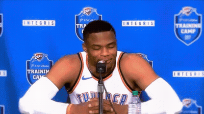 Basketball Player Sitting In Front Of Microphone Eyes Closed GIF