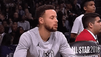 Basketball Player Sitting In Stands GIF
