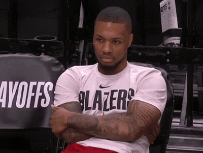 Basketball Player Sitting In Stands Arms Crossed Blazers Shirt GIF