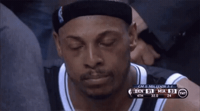Basketball Player Sitting In Stands Eyes Closed GIF