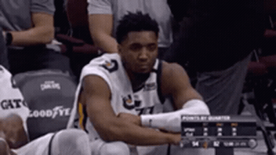 Basketball Player Sitting In Stands GIF