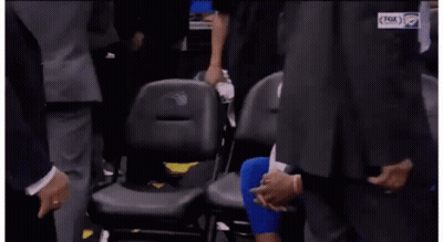 Basketball Player Sitting In Stands With Hands Folded GIF