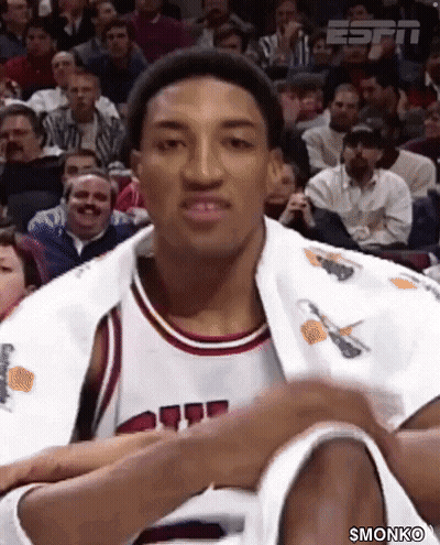 Basketball Player Sitting In White Jacket With Basketball GIF