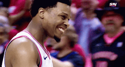Basketball Player Smiling In Front Of Crowd GIF