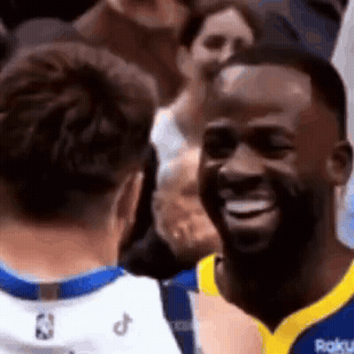 Basketball Player Smiling Talking To Another GIF