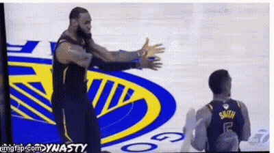 Basketball Player Smith In Front Of Golden State Warriors Logo GIF