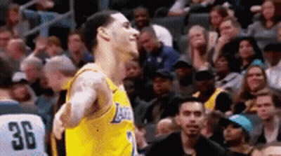 Basketball Player Standing In Front Of Crowd GIF