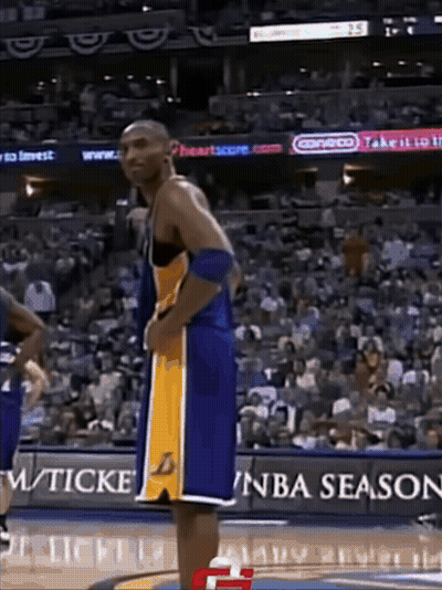 Basketball Player Standing In Front Of NBA Season Sign GIF