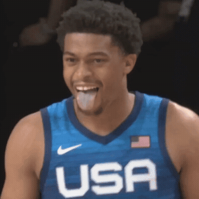 Basketball Player Sticking Tongue Out In Blue USA Jersey GIF