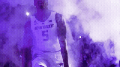 Basketball Player Walking Through Smoke Tunnel GIF