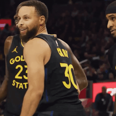 Basketball Player Wearing A Black Jersey With The Number 30 On The Back GIF