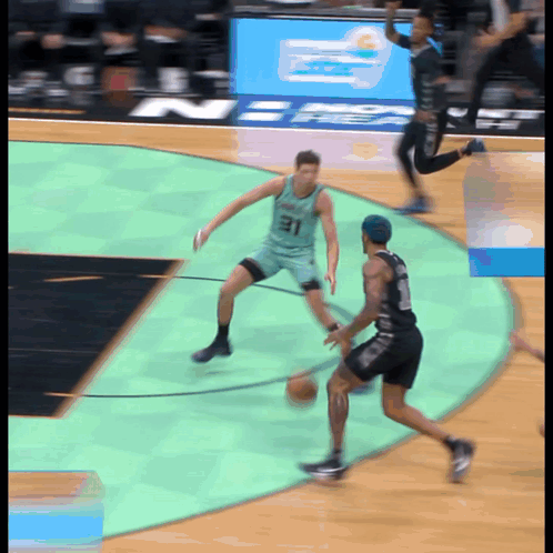 Basketball Player Wearing Number 31 Dribbling GIF