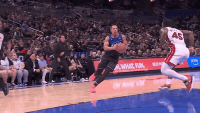 Basketball Player Wearing Number 45 Dribbling GIF