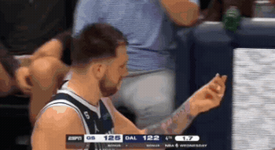 Basketball Player With Arm Tattoo Sitting On Bench GIF