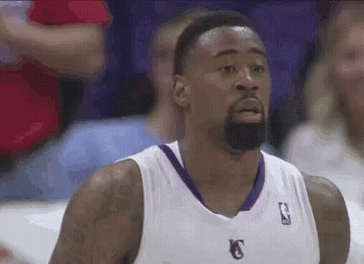 Basketball Player With Beard In White Jersey With Letter K GIF