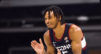 Basketball Player With Dreadlocks And Connecticut Jersey GIF