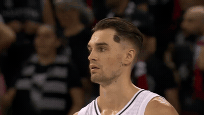 Basketball Player With Forehead Tattoo Looks At Camera GIF