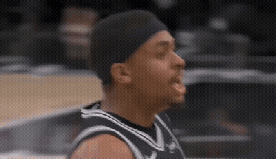 Basketball Player With Headband And Black And White Jersey GIF