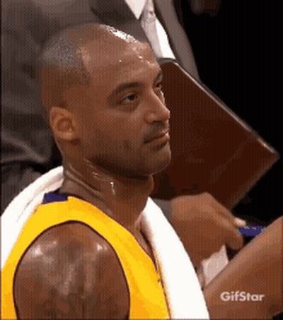 Basketball Player With Towel Around Neck And Gifstar Logo GIF