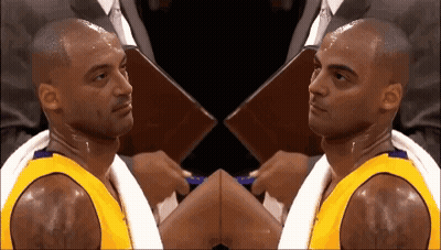 Basketball Player With Towel Around Neck Looking At Camera GIF