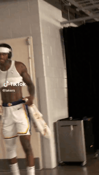 Basketball Player Without Shirt Holding Towel GIF