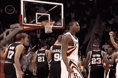 Basketball Players Around Hoop Number 9 GIF
